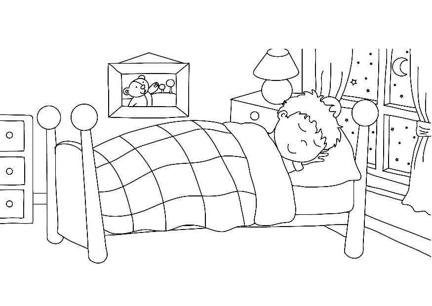 Anak laki-laki tidur di kamar tidur